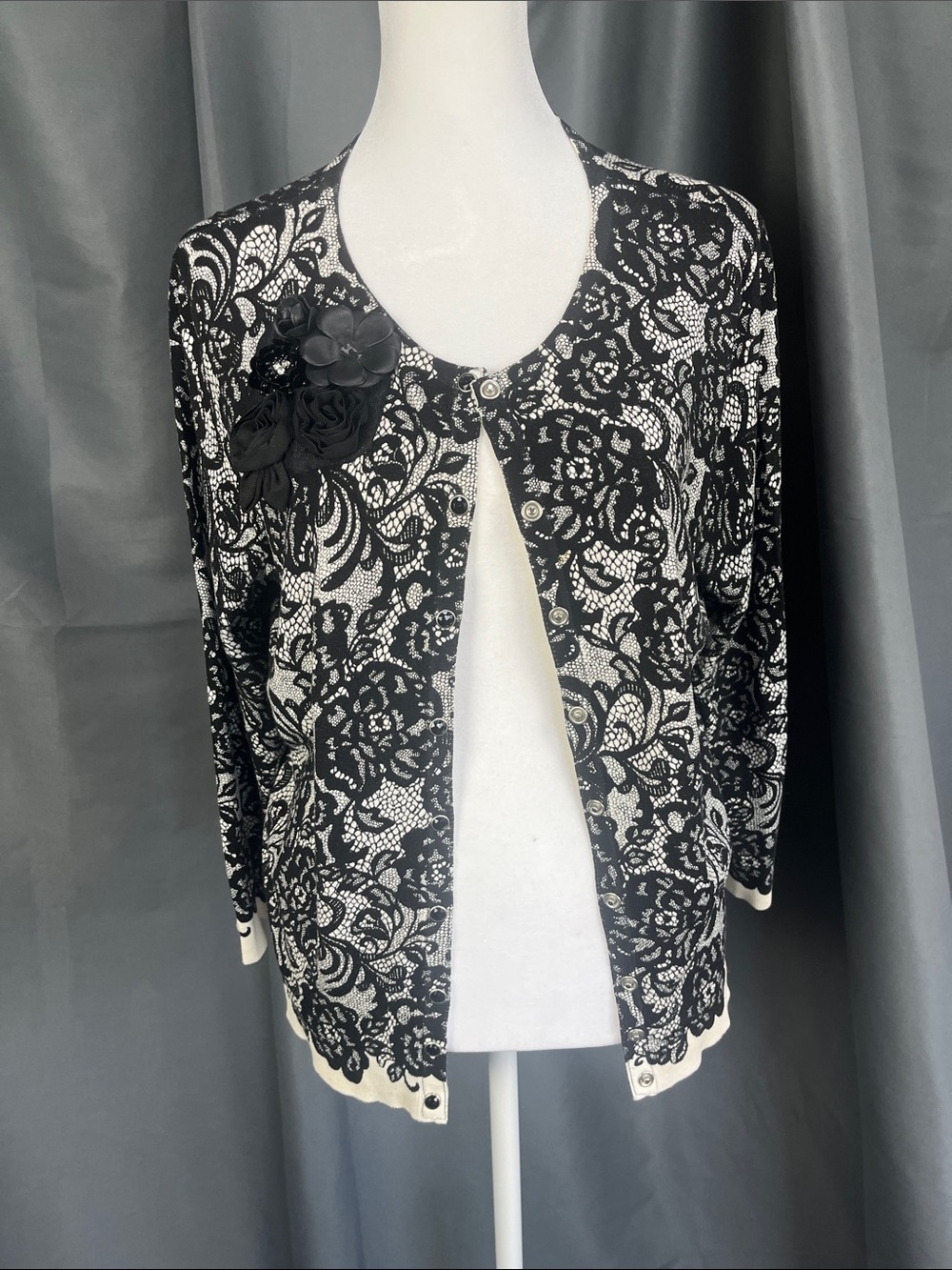 White House Black Market Black & White Lace-Pattern Cardigan with Floral Brooch